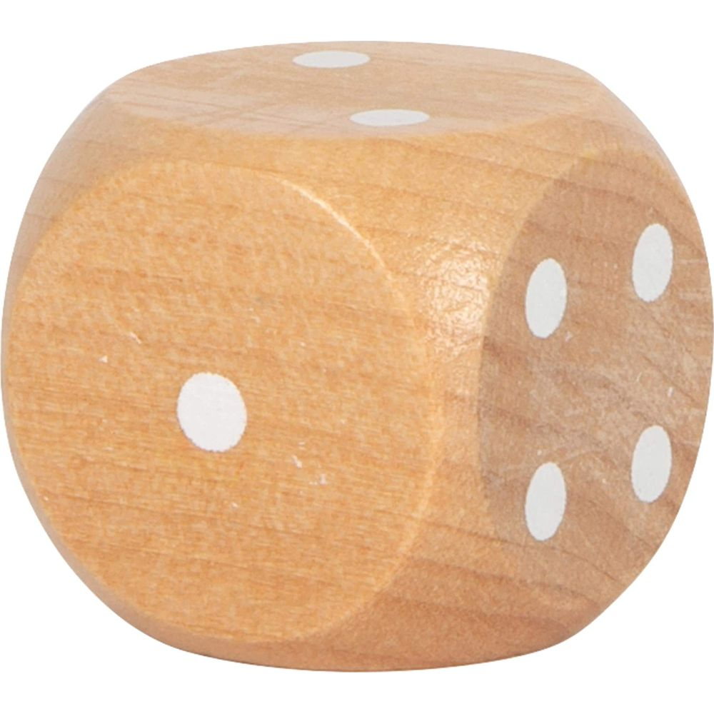 Un dado de madera con puntos blancos mostrando uno, cuatro y dos.