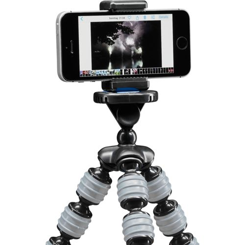 Un smartphone montado en un trípode flexible con tres patas plegables.