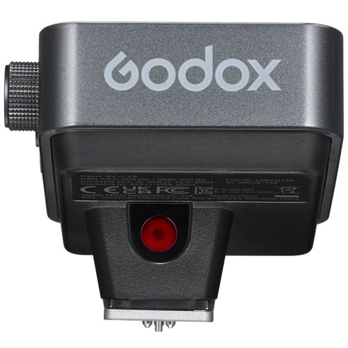 Grijze Godox flitser met draaiknop en rode knop.