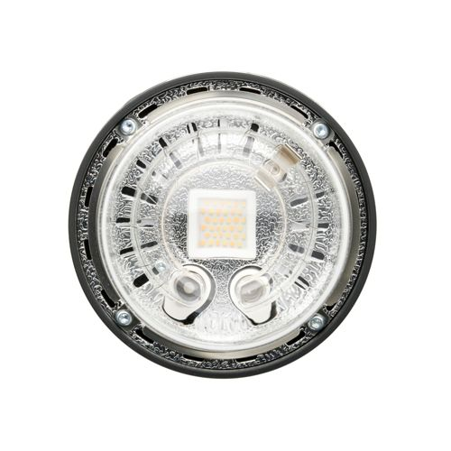Gros plan d'une lampe LED ronde avec un bord noir et des composants internes visibles.