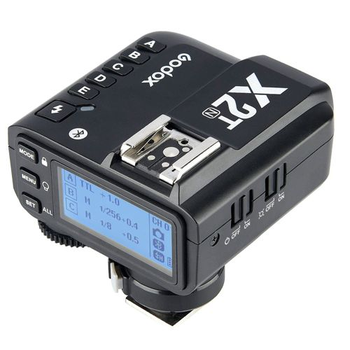 Schwarzer Godox X2T Blitz-Trigger mit LCD-Display und Tasten für Fotoaufnahmen.