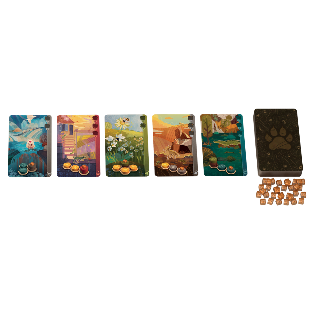 Seis cartas de juego coloridas con motivos de animales y naturaleza, junto a un libro y dados.