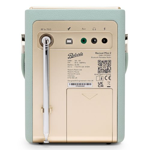 Retro di una radio Roberts Revival Mini 2 verde menta e oro, con porte ed etichette.