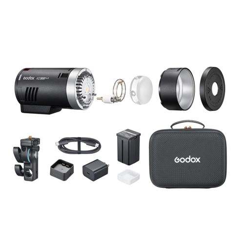 Godox Blitzgerät AD300 Pro mit Zubehör, Akku, Ladekabel und Tasche.