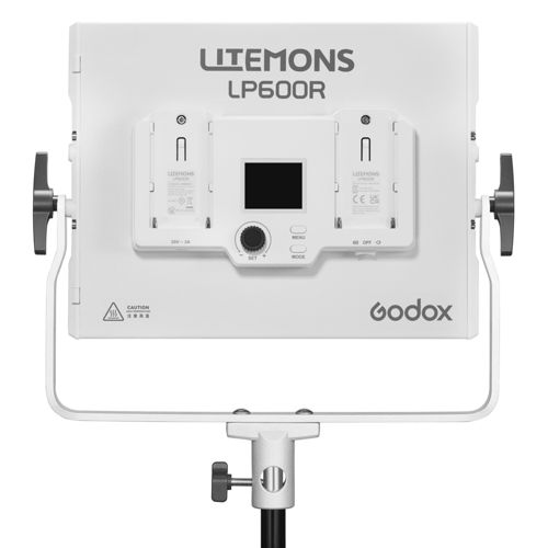 Ein weißes Godox LP600R Lichtpanel mit zwei Akkuschächten, einem Bildschirm und Bedienelementen.