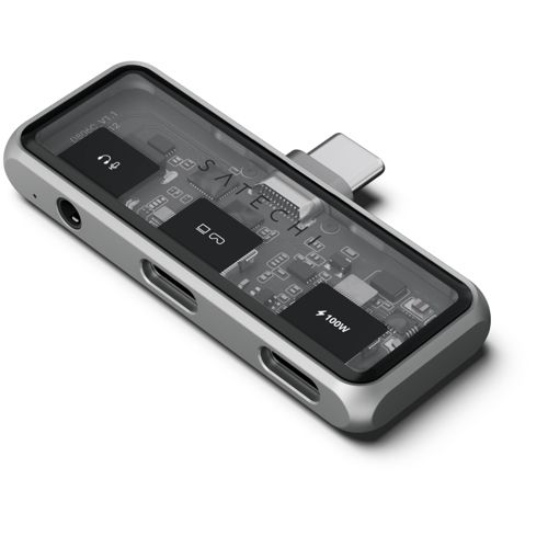 Ein silberner USB-C-Hub mit transparentem Gehäuse, der die interne Platine zeigt.