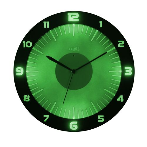 Eine grüne Wanduhr mit schwarzen Zahlen und Leuchtzeigern.
