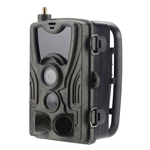 Una cámara de rastro verde de camuflaje con antena y lente.