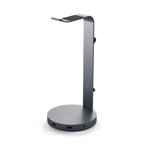Supporto per cuffie grigio con base rotonda e porte USB.