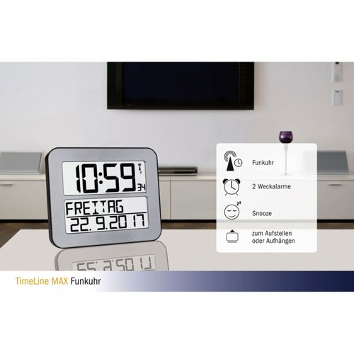 Digitaluhr zeigt 10:59 und Freitag, 22.9.2017. Daneben Icons: Funkuhr, 2 Weckalarme, Snooze.