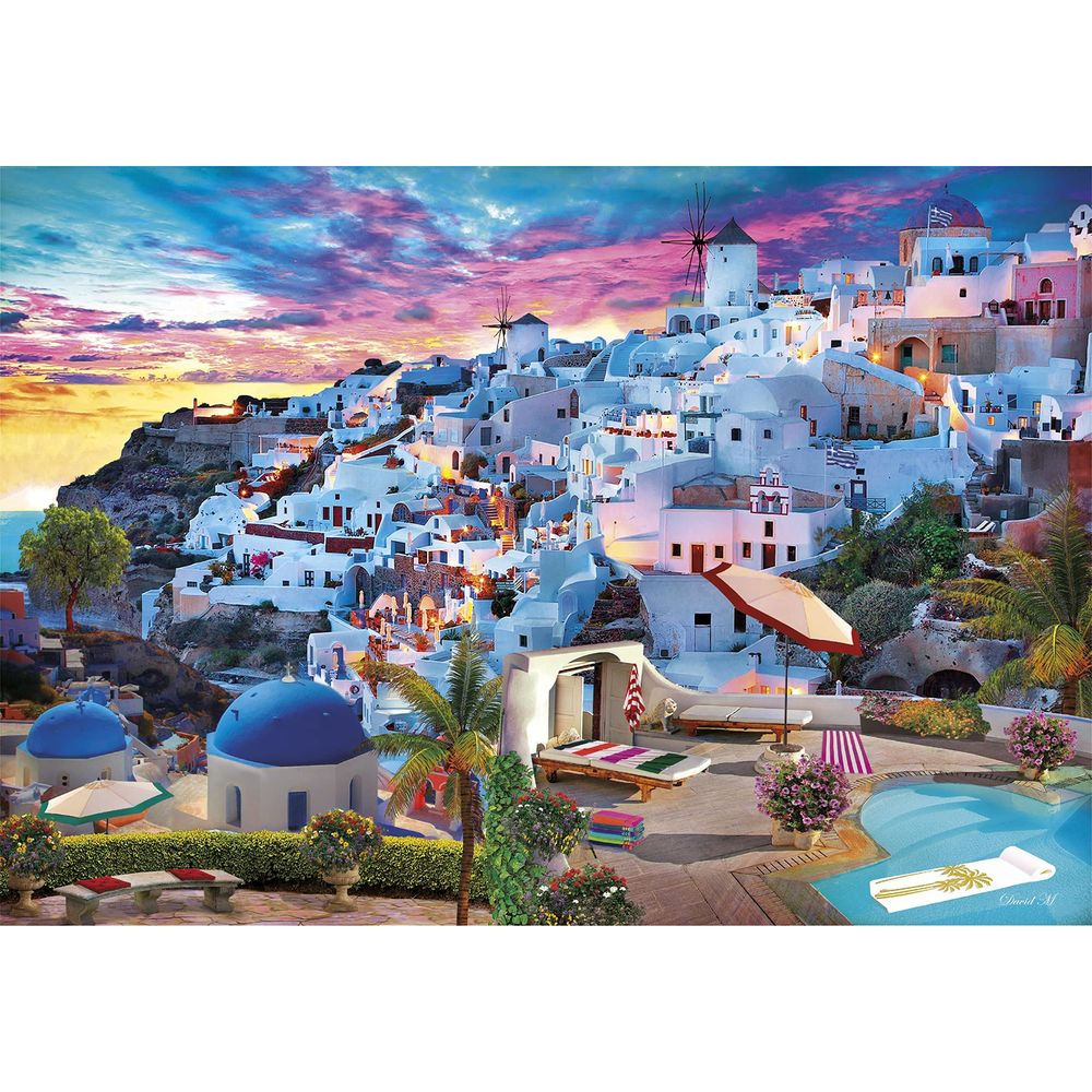 Casas blancas en una colina al atardecer con molinos y piscina.