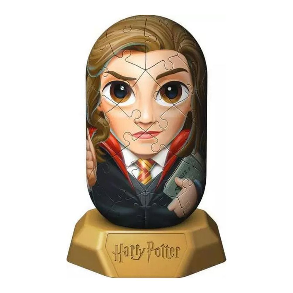 Puzzle 3D di Hermione Granger in uniforme di Hogwarts che tiene un libro su un supporto dorato di Harry Potter.