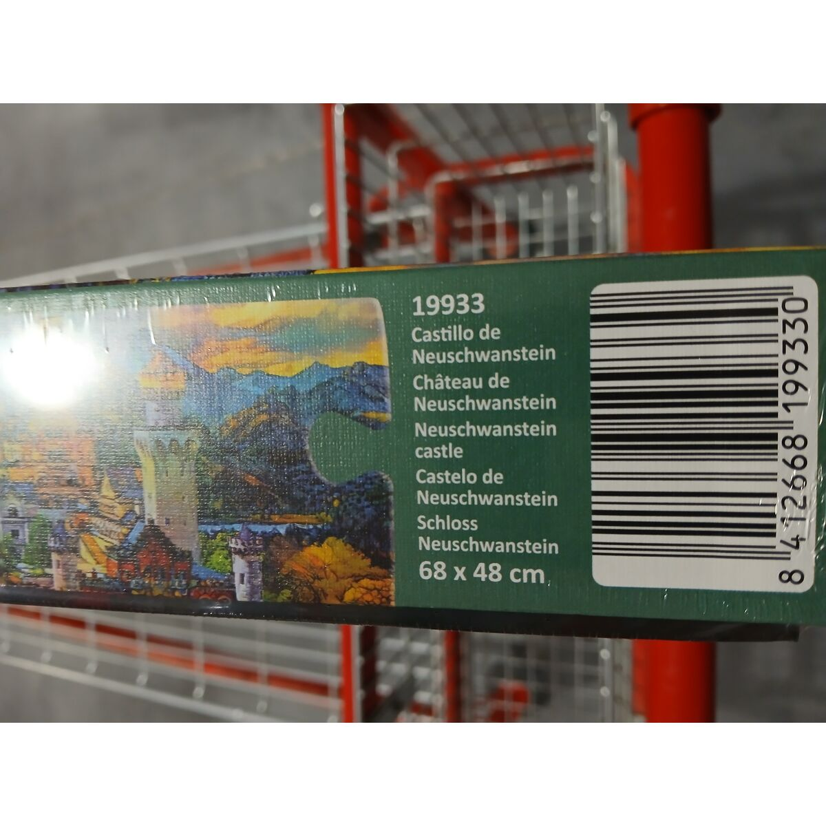 Confezione puzzle mostra il castello di Neuschwanstein e codice a barre.