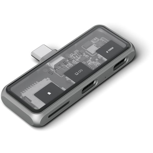 Silberne USB-C-Nabe mit transparenter Oberseite, die interne Schaltkreise und Anschlüsse zeigt.
