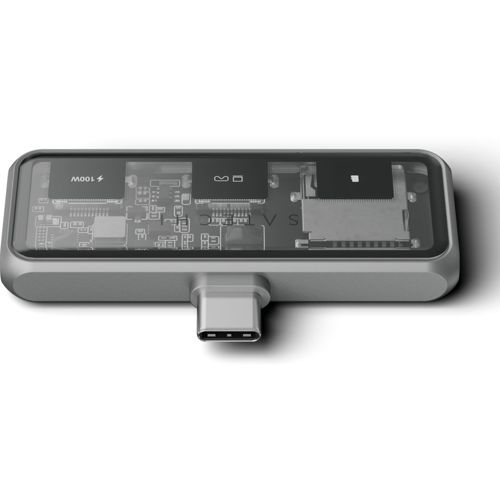 Ein USB-C-Hub mit transparentem Gehäuse zeigt interne Komponenten wie Chips und Anschlüsse.