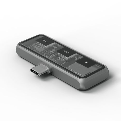 Grauer USB-C-Hub mit transparenter Oberseite, die interne Schaltungen und Chips zeigt.