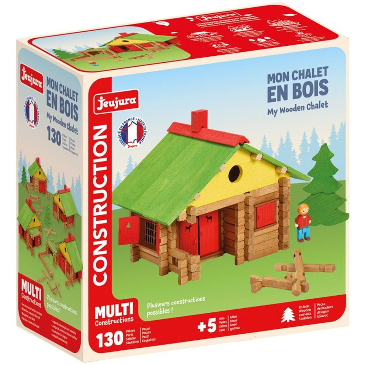 Scatola di un set di costruzioni per chalet in legno con molti pezzi. Presenta una casa modello, alberi e una figura giocattolo.