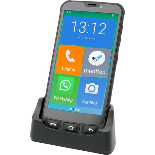 Ein Smartphone mit großen Symbolen für Telefon, Mediteo, WhatsApp und Kamera auf einem Ständer.