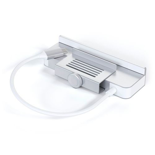 Ein silberner USB-C-Hub mit einem Drehknopf und einem Gitterdetail.