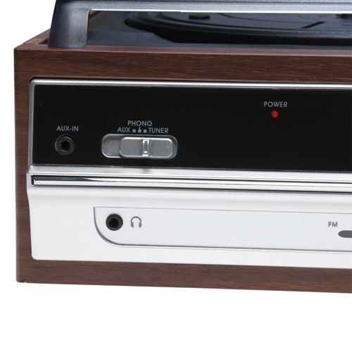Close-up of a turntable with AUX-IN, a switch, and a red power LED.
