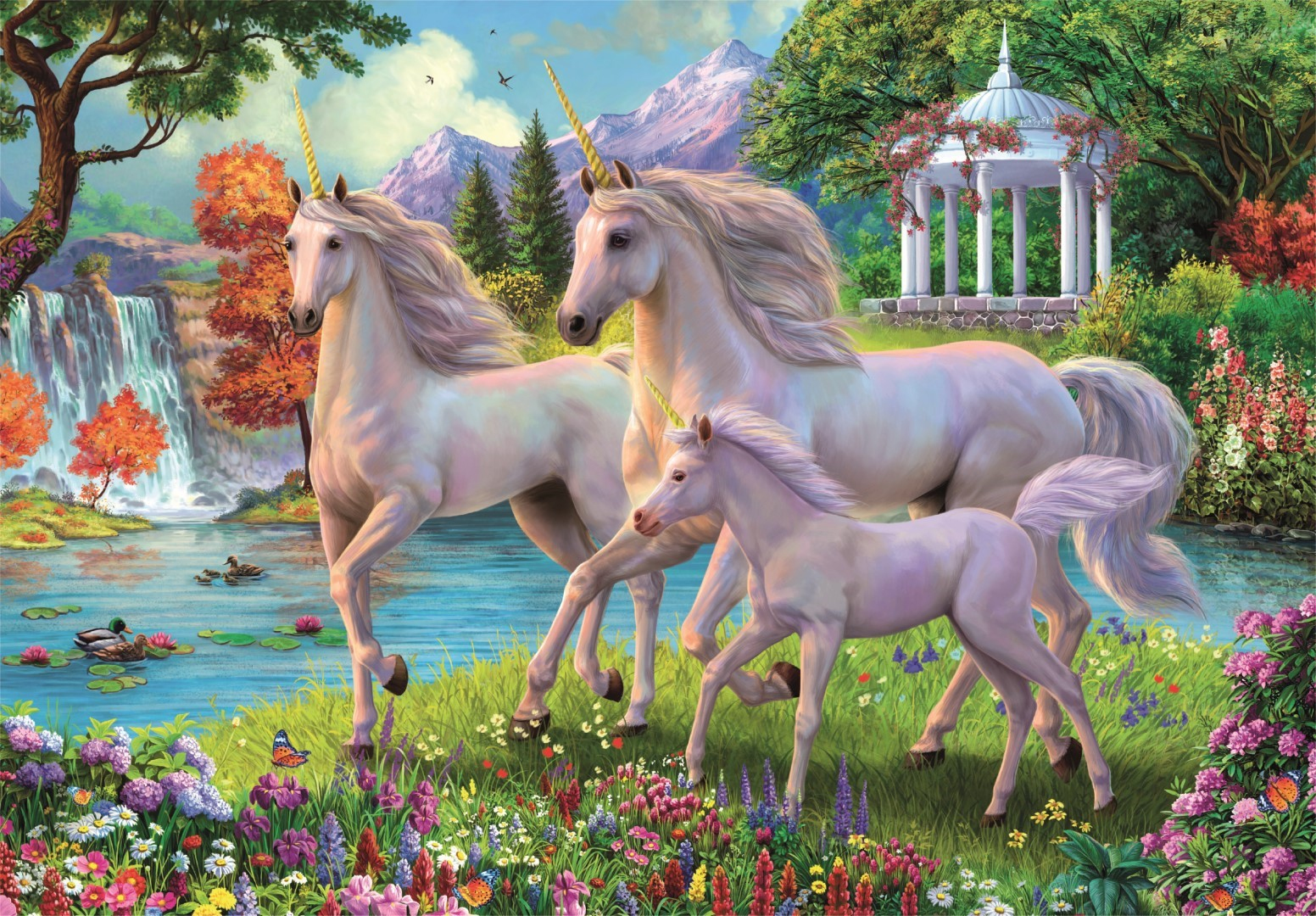 Tres unicornios en un prado con cascada y glorieta.