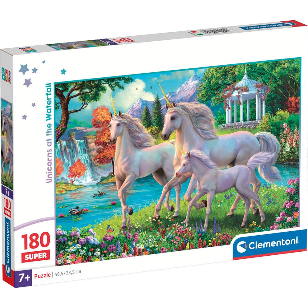Tres unicornios blancos en prado florido ante cascada y montañas.