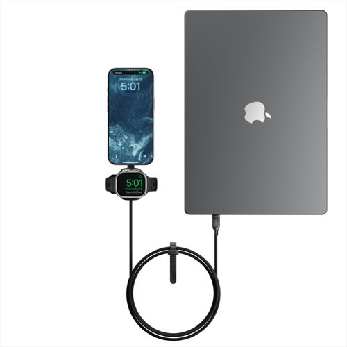 Un laptop grigio Apple è collegato a un cavo nero che gira attorno a un caricatore.