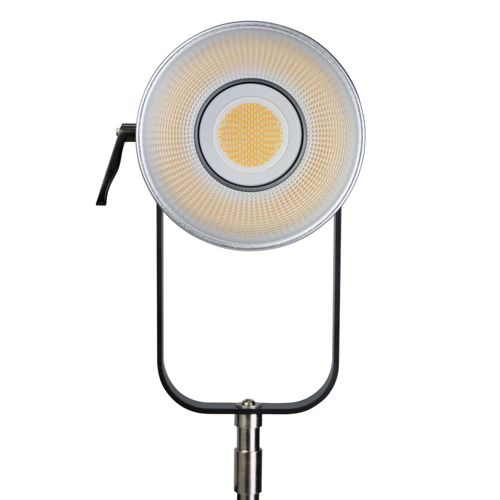 Ein rundes LED-Licht mit silbernem Gehäuse und schwarzem Bügel.