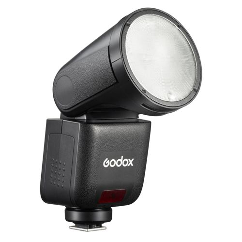 Zwarte Godox cameraflitser met witte lichtdiffusor. Witte achtergrond.