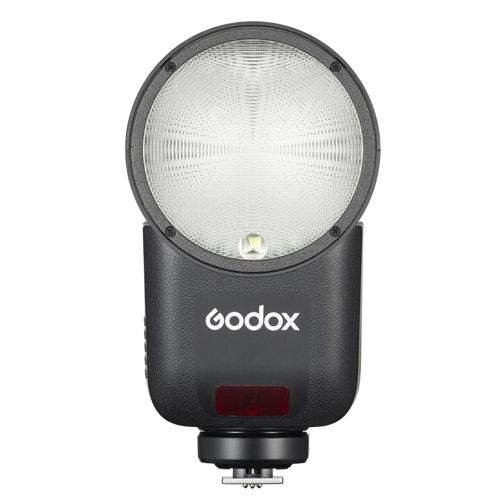 Een zwarte Godox flitser met een ronde lamp en zilveren flitslamp.