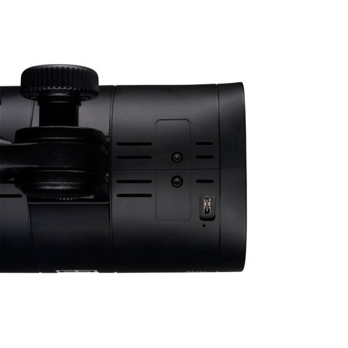 Boîtier de caméra noir avec bouton rotatif et port USB.