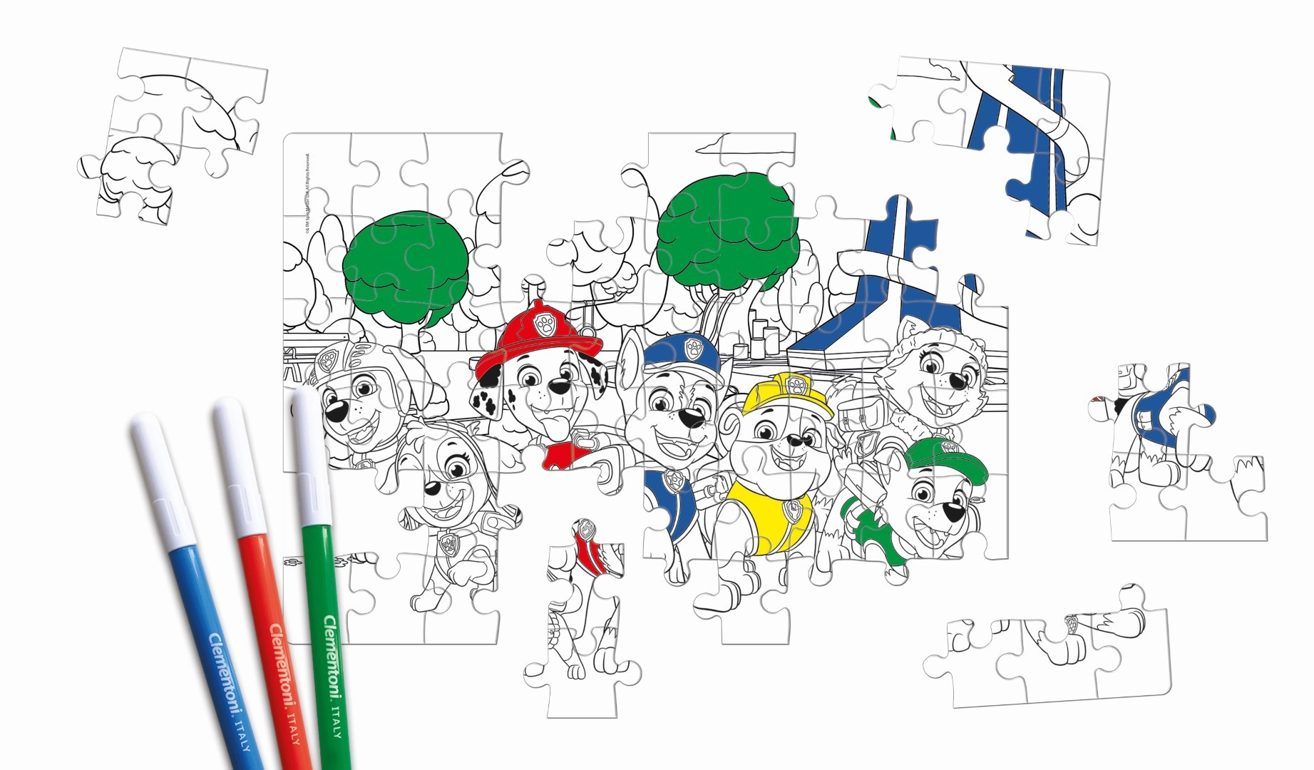 Kawałki puzzli z psami z Psiego Patrolu, trzy pisaki po lewej.
