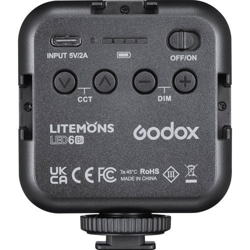 Compacte zwarte Godox Litemons LED6Bi lamp met bedieningselementen en poorten.
