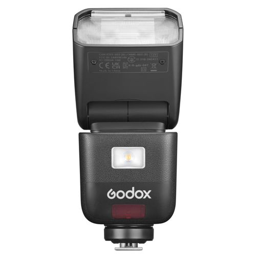 Flash Godox noir avec lumière blanche et LED rouge. Un réflecteur de flash est en haut.