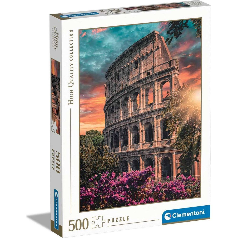 El Coliseo al atardecer con flores púrpuras delante.