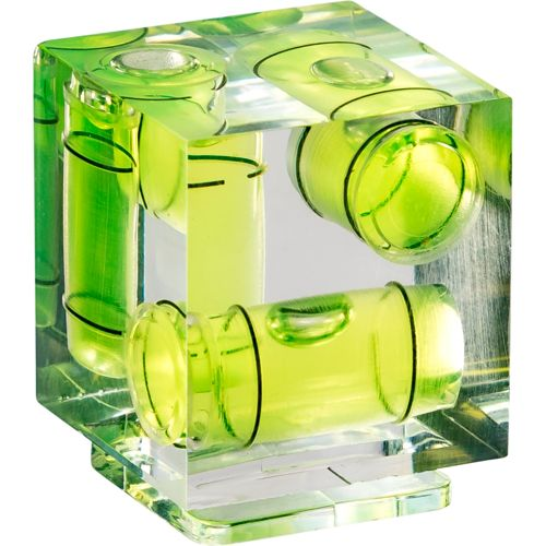 Una livella a bolla cubica con liquido verde in più tubi.