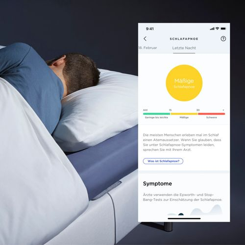 Uomo che dorme, telefono mostra dati apnea notturna. Apnea moderata.