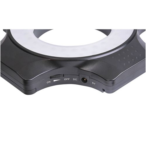 Ein schwarzer Ringlichtadapter mit Ein-/Aus-Schalter und DC-Anschluss.