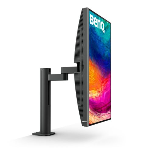 Een zwarte monitor met kleurrijke abstracte achtergrond is gemonteerd op een zwarte arm.