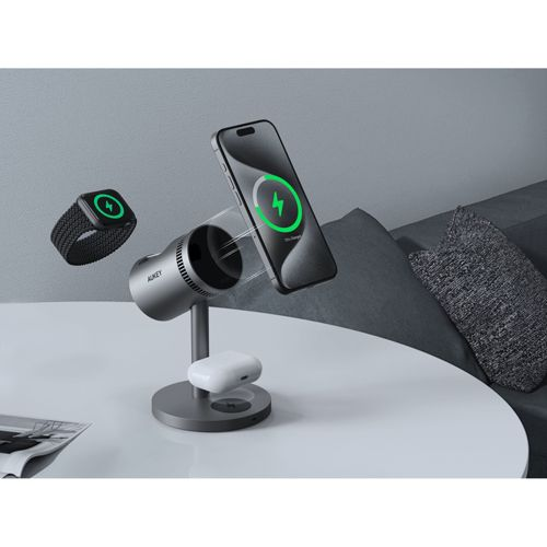 Graues Ladegerät mit iPhone, Apple Watch und AirPods.