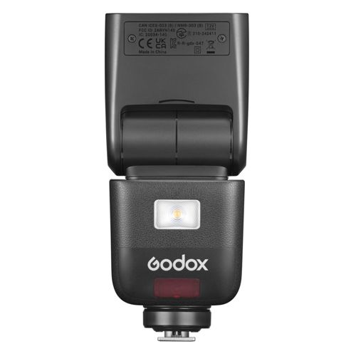 Flash Godox noir avec lumière argentée et diode rouge. Détails techniques imprimés en haut.