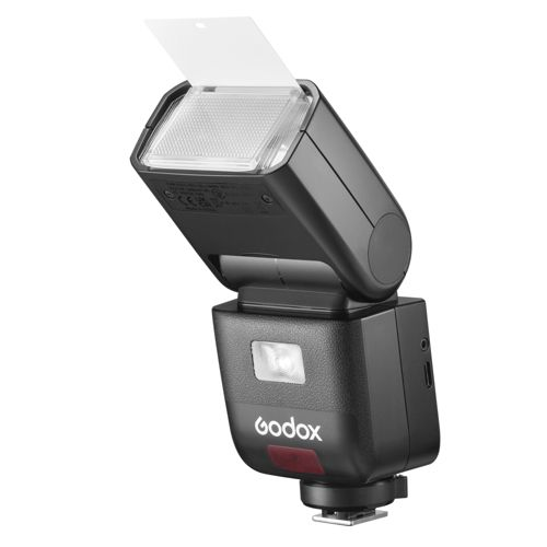 Un flash de caméra noir avec un diffuseur escamotable et le logo Godox.