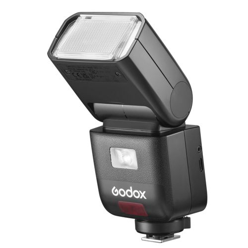 Un flash Godox noir avec une lumière LED blanche et un voyant rouge.