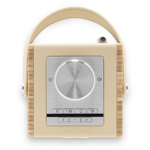 Une radio beige avec cadran argenté et boutons de commande.