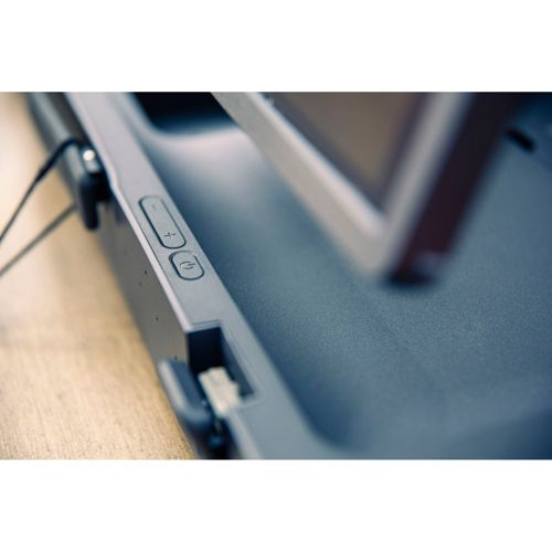 Nahaufnahme von Lautstärketasten und einem Netzschalter an einem grauen Gerät.