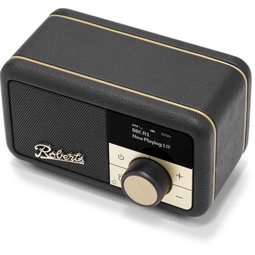 Una radio retrò nera con finiture dorate e griglia dell'altoparlante.