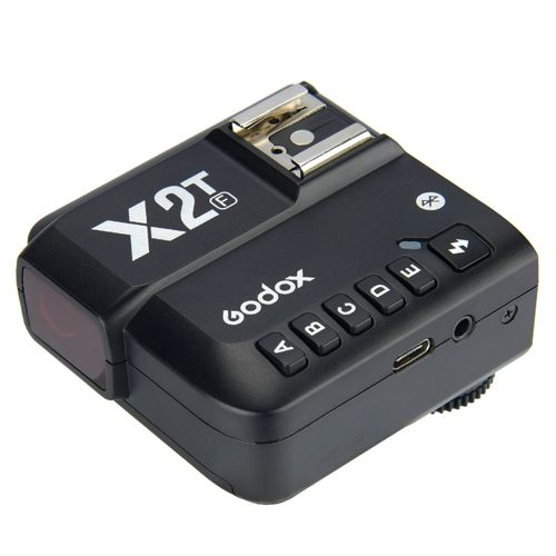 Trasmettitore Godox X2T nero con pulsanti A-E, porta USB-C e icona flash.
