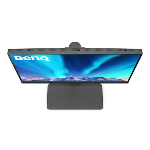 Een BenQ monitor die het noorderlicht toont, met een donkere standaard eronder.