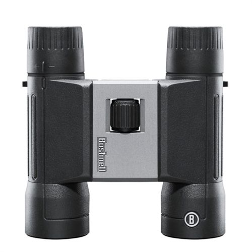 Zwarte en zilveren Bushnell verrekijker met scherpstelwiel en afstelmarkeringen.