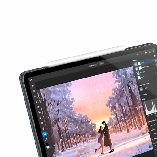 A tablet displays a digital drawing of a couple in the snow at sunset.